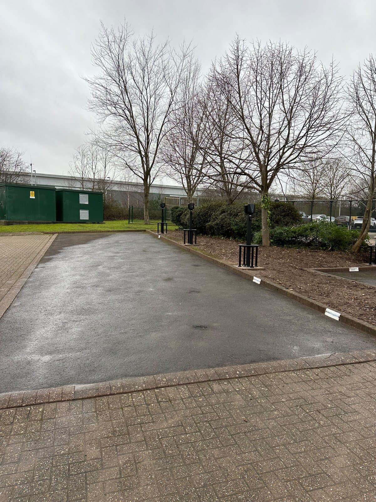 Charge points installed across a business park car park, supplies run in underground