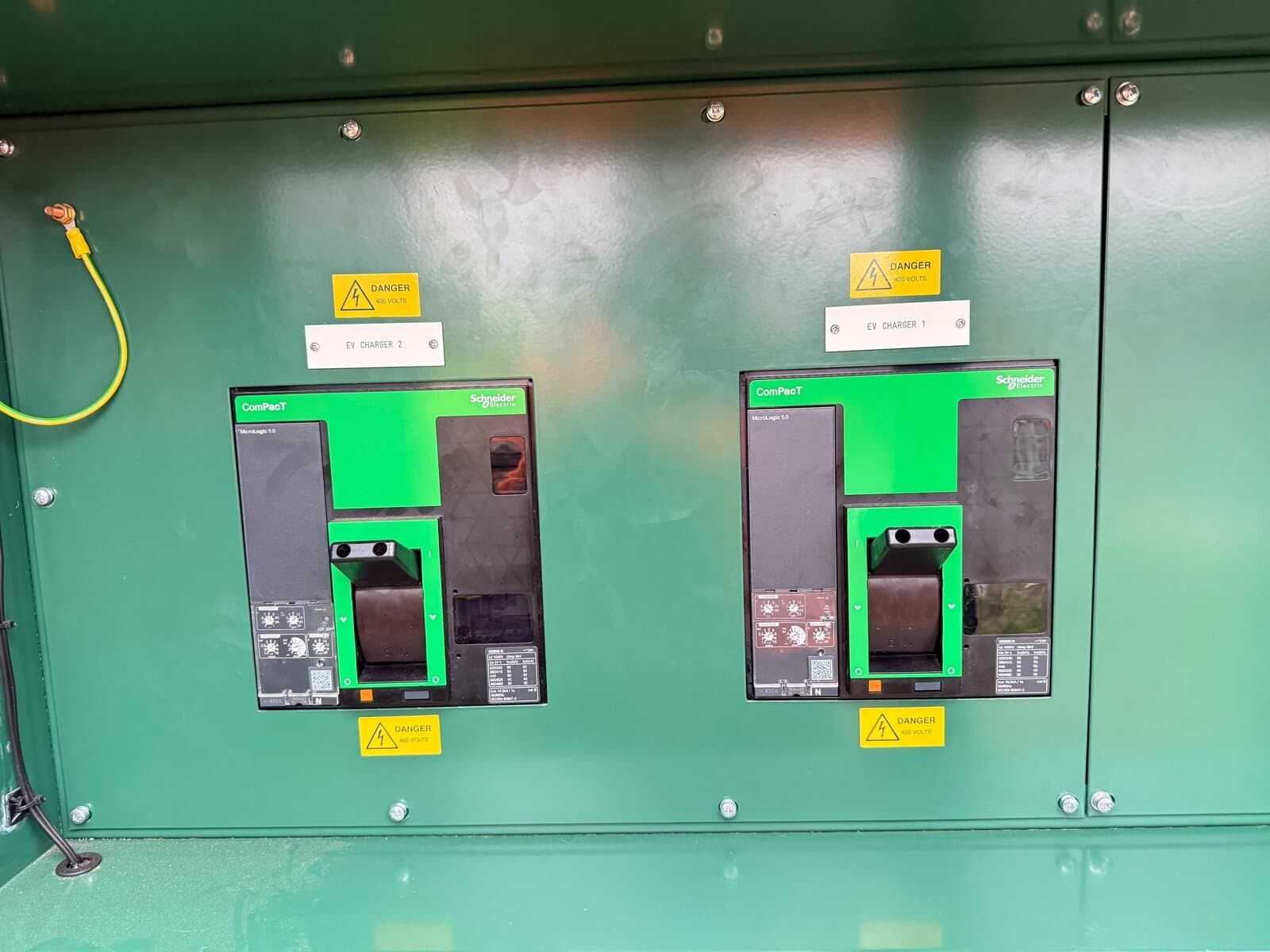 Moulded case circuit breakers mounted behind their shrouds in a distribution pillar