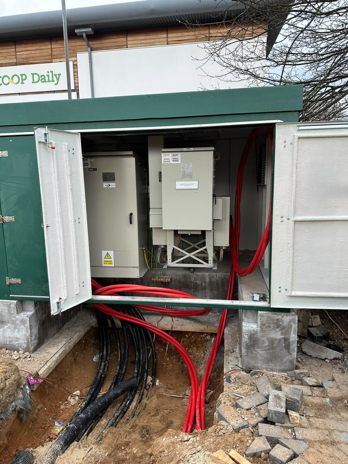Feeder pillar opened up with the single-core supply cables run down into the ducts below